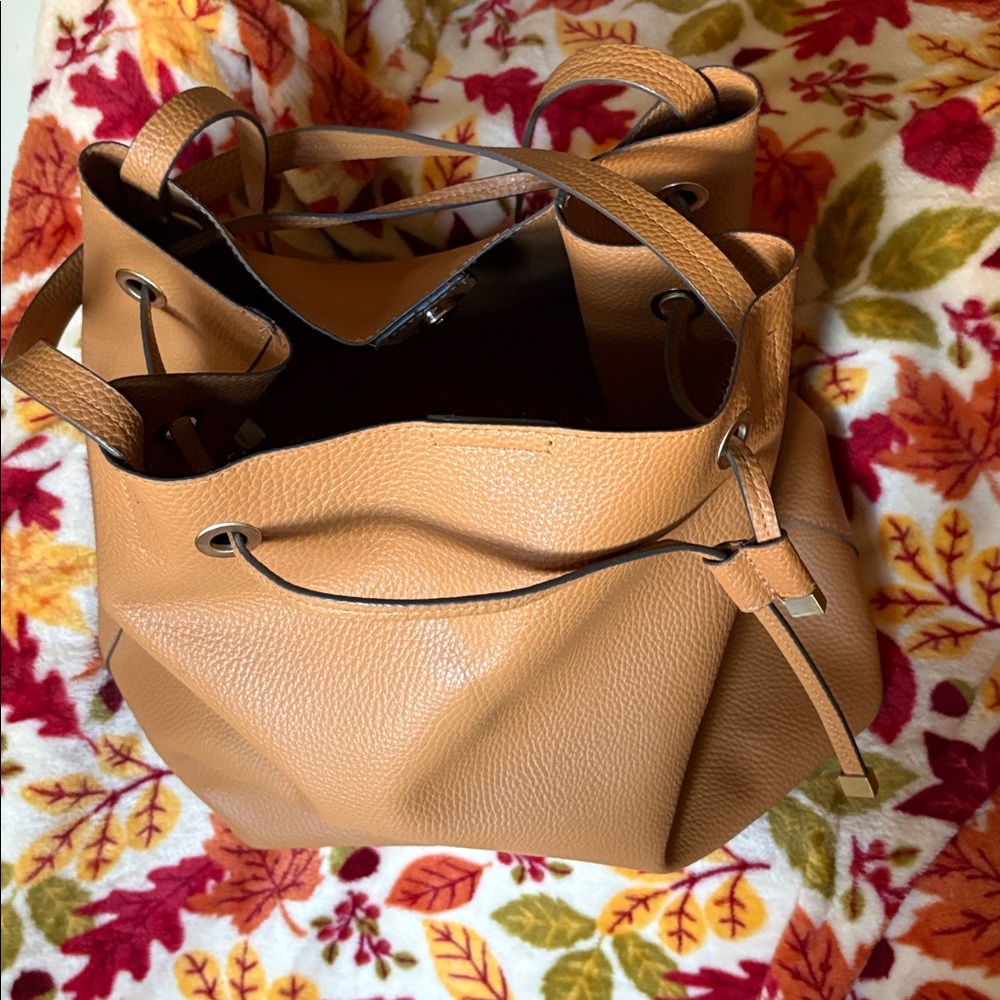 Tan Faux Leather Bucket Bag with Drawstring and Snap Closure